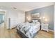 Main bedroom with white dresser and blue accent wall at 3345 Atwell Ave, The Villages, FL 32162