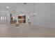 Bright dining room with wood flooring and a chandelier at 508 Little River Path, The Villages, FL 32162