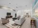 Living room with staged furniture at 5126 County Road 125, Wildwood, FL 34785