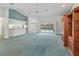 Open living space with a view of the pool at 5126 County Road 125, Wildwood, FL 34785