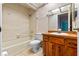 Bathroom with tub, toilet, and wood vanity at 636 Mount Homer Rd # 636, Eustis, FL 32726
