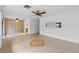 Bright living room with tile floors and ceiling fan at 636 Mount Homer Rd # 636, Eustis, FL 32726