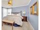 Bedroom with king-size bed and window seat at 6607 Crestmont Glen, Windermere, FL 34786