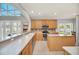 Kitchen boasts wood cabinets, stainless steel appliances, and an island at 6607 Crestmont Glen, Windermere, FL 34786