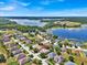 Aerial view showing home's position in a quiet, residential neighborhood at 9249 Ivywood St, Clermont, FL 34711