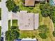 Aerial view of house and surrounding area, showing large lot and neighborhood at 9249 Ivywood St, Clermont, FL 34711