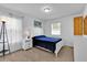Comfortable bedroom with a double bed and nightstand at 9249 Ivywood St, Clermont, FL 34711