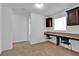 Cozy home office with built-in desk and window seat at 9249 Ivywood St, Clermont, FL 34711