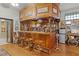 Rustic wooden home bar with seating at 1600 Se 52Nd St, Ocala, FL 34480