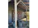 Gray barn with red X-design doors at 1600 Se 52Nd St, Ocala, FL 34480
