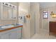 Bright bathroom with shower, vanity, and tiled floor at 1600 Se 52Nd St, Ocala, FL 34480