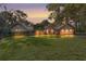 Beautiful ranch home with a large front yard and mature trees at 1600 Se 52Nd St, Ocala, FL 34480