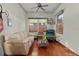 Relaxing game room featuring a comfy couch and wood floors at 1600 Se 52Nd St, Ocala, FL 34480