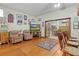 Game room with leather armchairs and wood floors at 1600 Se 52Nd St, Ocala, FL 34480