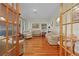 Spacious living room with hardwood floors and French doors at 1600 Se 52Nd St, Ocala, FL 34480