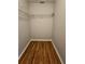 Spacious walk-in closet with wire shelving and wood flooring at 1761 12Th St, Orange City, FL 32763
