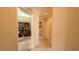 Clean hallway with access to bathroom and home office at 1881 Sassparilla Way, The Villages, FL 32162