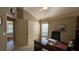 Home office with desk, chair, and access to other rooms at 1881 Sassparilla Way, The Villages, FL 32162