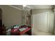 Bright home office features built-in shelving and a large desk at 1881 Sassparilla Way, The Villages, FL 32162