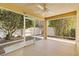 Relaxing screened patio with ceiling fan at 2169 Smoaks St, The Villages, FL 32162