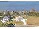 Single story home with a large yard and lake view at 3219 Landing Vw, Tavares, FL 32778