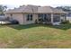 House with backyard and screened porch at 3219 Landing Vw, Tavares, FL 32778