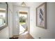 Bright and airy entryway with hardwood floors at 3219 Landing Vw, Tavares, FL 32778
