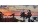 Stunning sunset over the lake at 3219 Landing Vw, Tavares, FL 32778