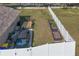 Side yard with garden beds and plenty of space for parking at 3219 Landing Vw, Tavares, FL 32778