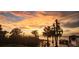 Beautiful sunset view over the lake at 3219 Landing Vw, Tavares, FL 32778
