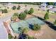 Community tennis court with surrounding landscaping at 3219 Landing Vw, Tavares, FL 32778