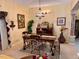 Elegant dining room with chandelier and ornate furniture at 752 Maybank Loop, The Villages, FL 32162