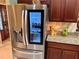 Stainless steel LG refrigerator with a built-in ice maker and water dispenser at 752 Maybank Loop, The Villages, FL 32162