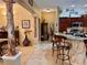 Bright kitchen with granite countertops and modern appliances at 752 Maybank Loop, The Villages, FL 32162