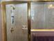 Clean shower stall with tiled walls and a glass enclosure at 752 Maybank Loop, The Villages, FL 32162