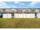 Townhouse community with well-maintained lawn and private fenced backyard at 4904 Sw 45Th St, Ocala, FL 34474