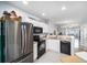 Kitchen with stainless steel appliances and white cabinets at 4904 Sw 45Th St, Ocala, FL 34474
