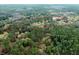 Aerial view showing home and expansive wooded lot at 12359 Ne Highway 314, Silver Springs, FL 34488