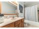 Bathroom with sink, toilet and tub shower combo at 12359 Ne Highway 314, Silver Springs, FL 34488