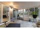 Relaxing screened porch with access to backyard at 12359 Ne Highway 314, Silver Springs, FL 34488