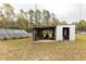 Workshop with solar panels and various tools at 12359 Ne Highway 314, Silver Springs, FL 34488