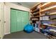 Cozy bedroom with built-in shelving and beanbag chair at 12359 Ne Highway 314, Silver Springs, FL 34488