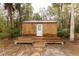 Wooden storage shed with deck at 12359 Ne Highway 314, Silver Springs, FL 34488