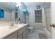 Clean bathroom with a tub, shower, and vanity at 12359 Ne Highway 314, Silver Springs, FL 34488