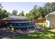 Above-ground pool with surrounding yard space at 5 Hemlock Terrace Pass, Ocala, FL 34472