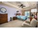 Spacious main bedroom with ceiling fan and ample closet space at 5 Hemlock Terrace Pass, Ocala, FL 34472