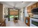 Kitchen nook with window seat provides a sunny breakfast area at 5 Hemlock Terrace Pass, Ocala, FL 34472