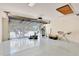 Garage with overhead storage and epoxy floor at 8033 Sw 81St Loop, Ocala, FL 34476