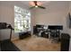 Bright home office with built-in workspace and large window at 14950 Nw 216Th Pl, Micanopy, FL 32667