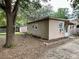 Rear view of house showing additional building and yard at 14468 Ne 204Th Ln, Fort Mc Coy, FL 32134